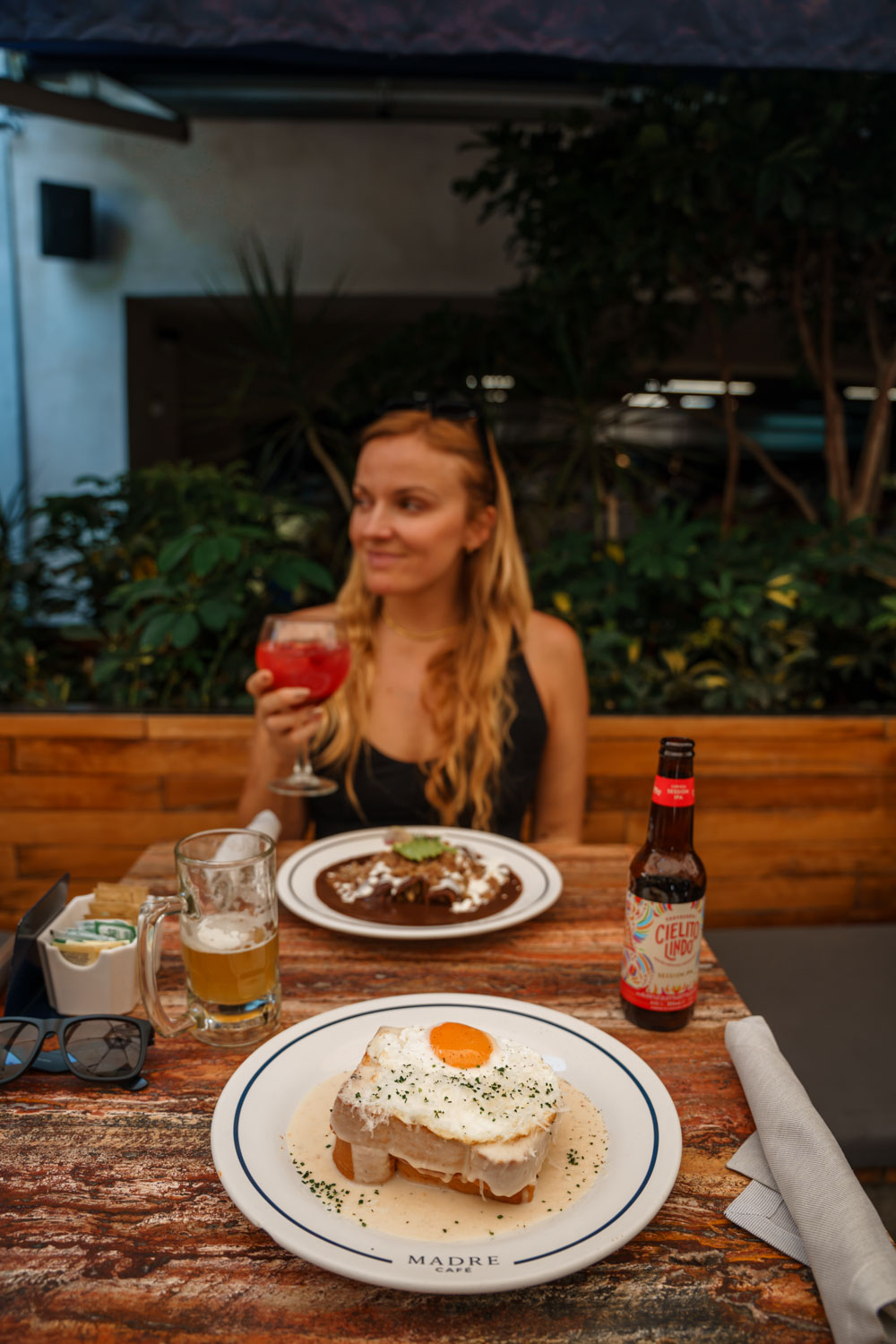 Author Mal eating frijolada at Madre Restaurant in Roma